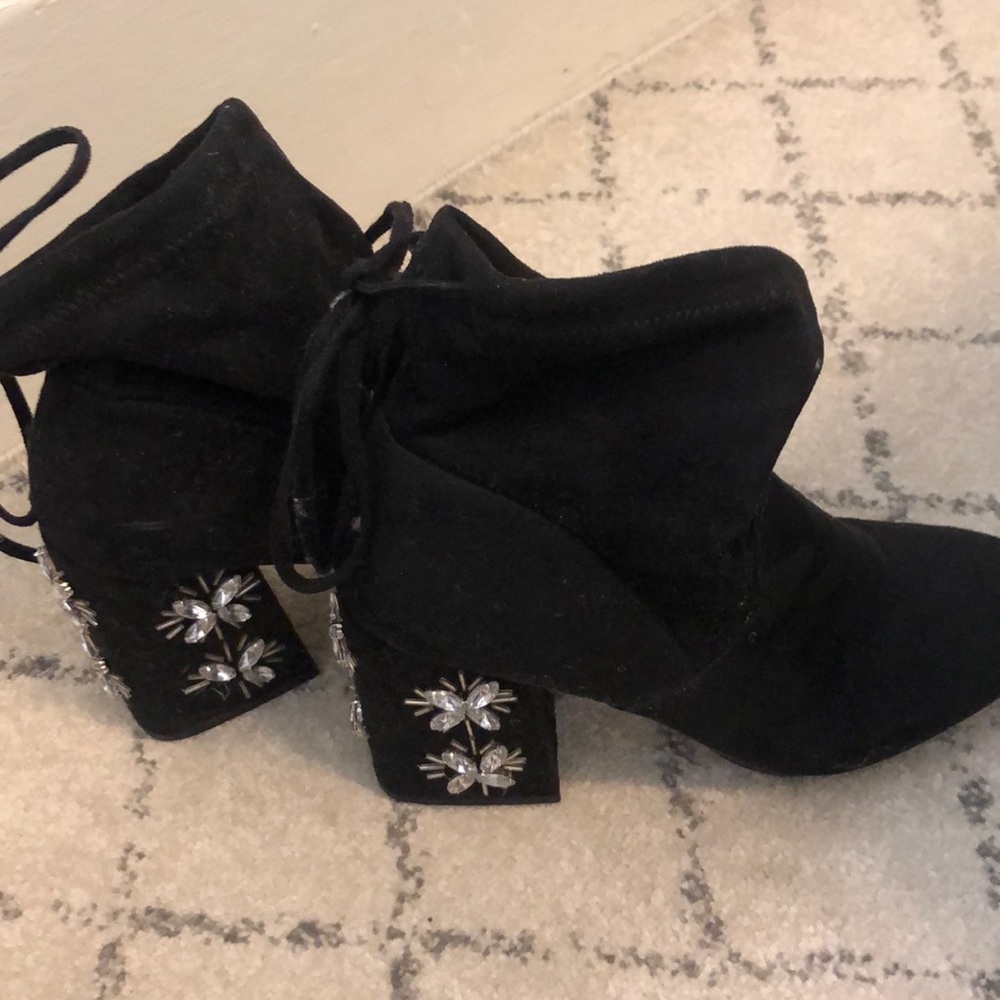 Black boots with bedazzled heels
